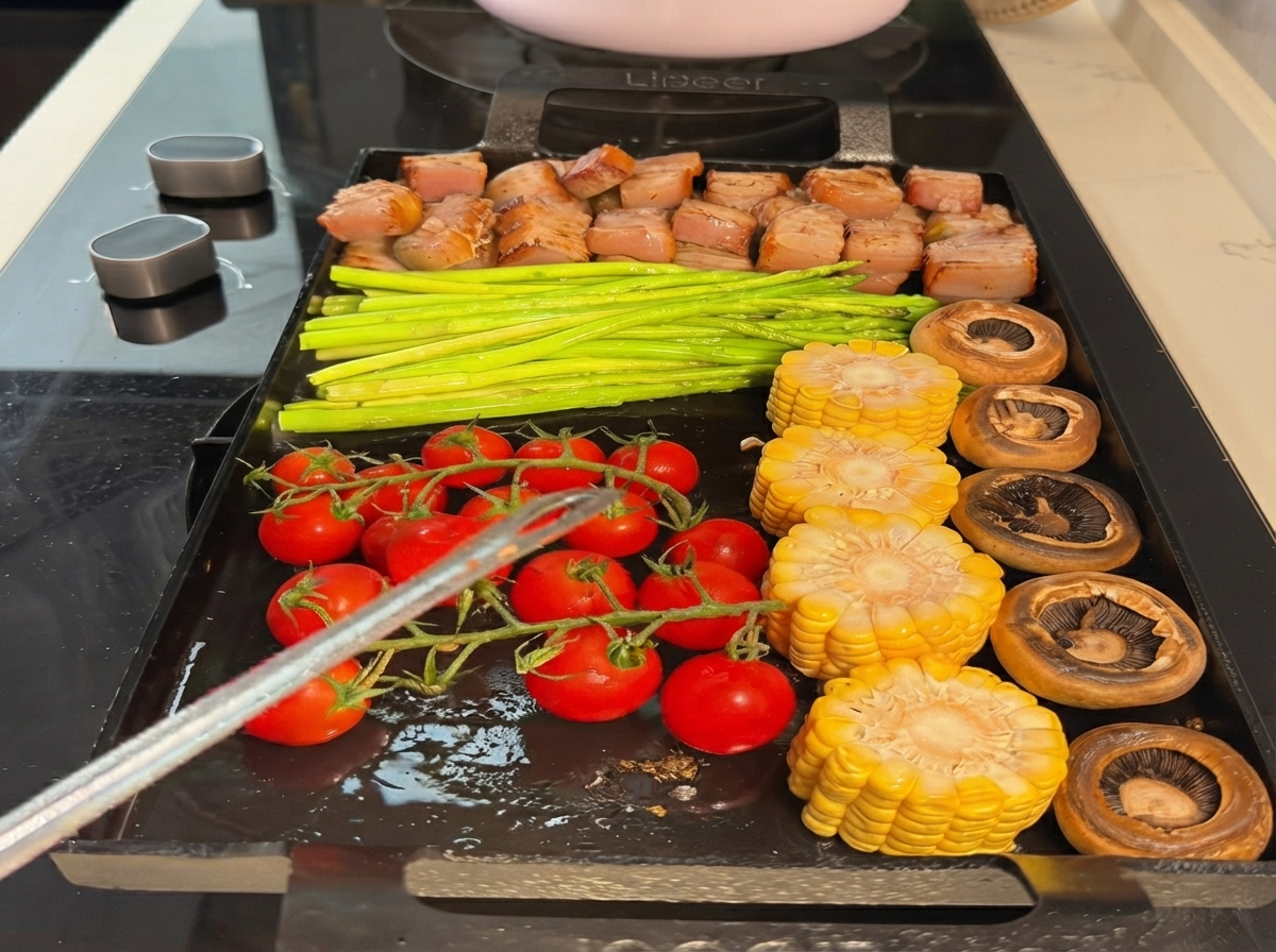 Des carottes ajoutées à la sélection de grillades sur la poêle teppanyaki.
